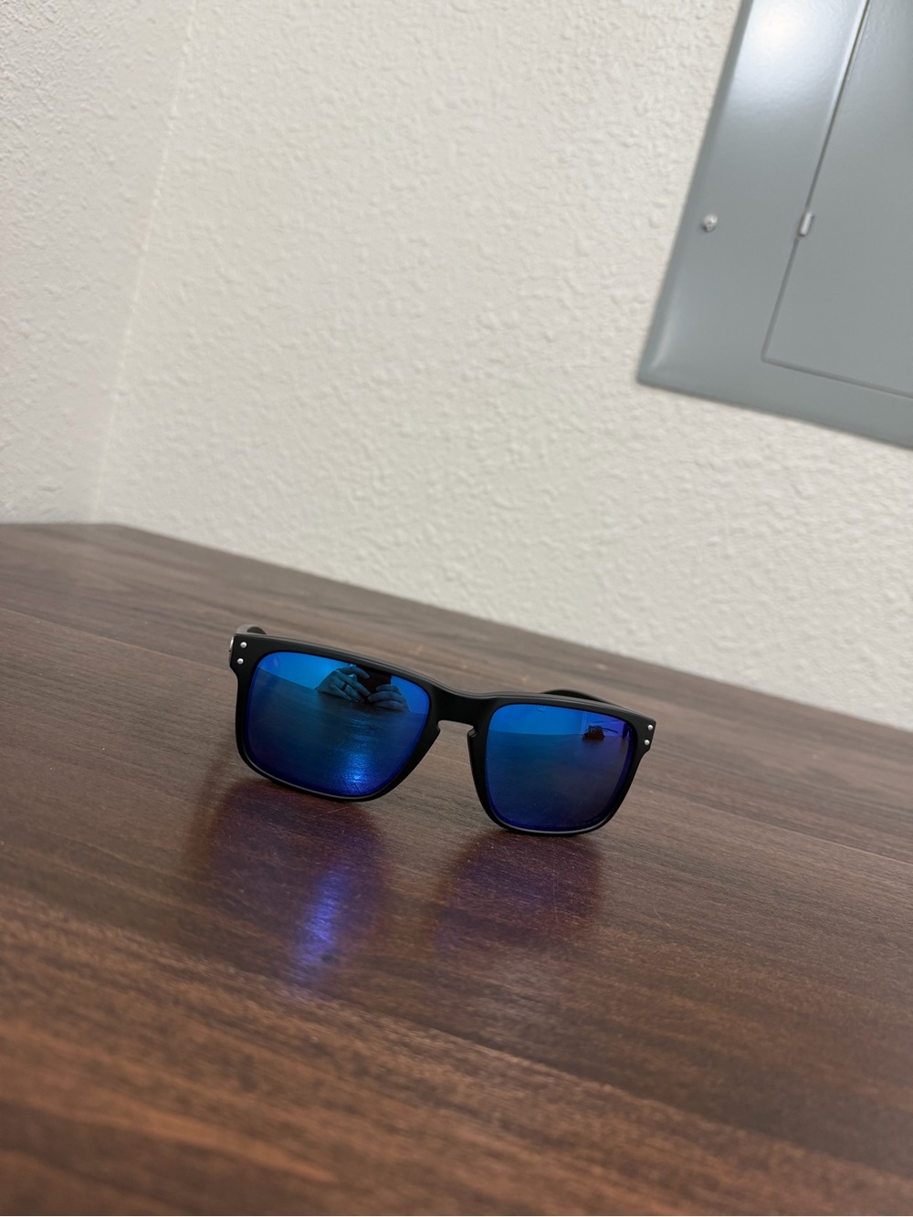 Black Frame Oakley Sunglasses with Polarized Blue Mirrored Lenses
